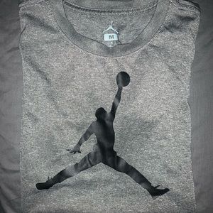 Nike Boys M Dri-Fit charcoal colored shirt.